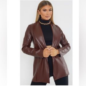 Brand new blazer, with tags. Did not match with my original outfit